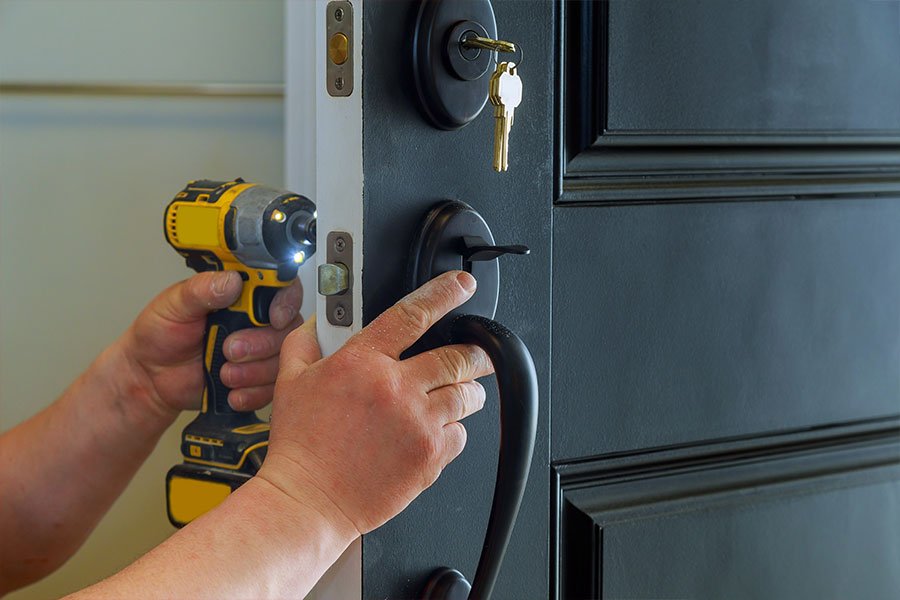 Professional commercial locksmith unlocking a secure business door - Expert services by Blueline Locksmith